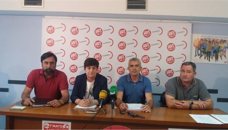 Representantes sindicales en rueda de prensa