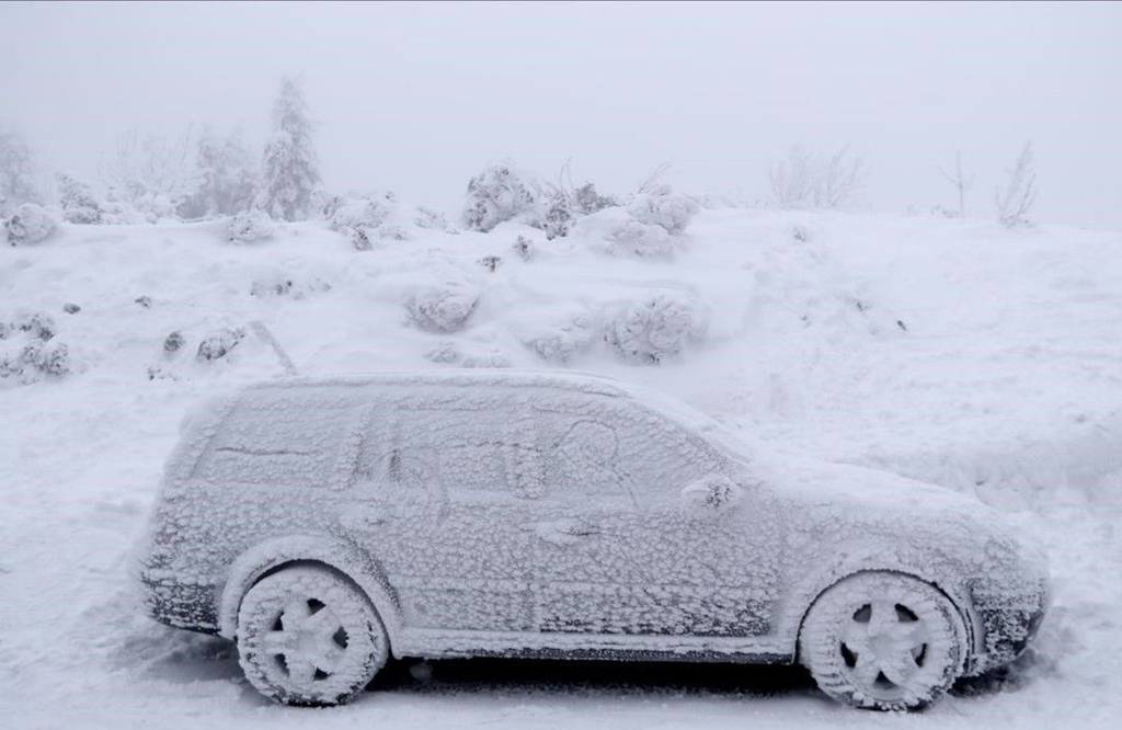 A car covered in ice is parked near Destne v Orlickych Horach Czech Republic Monday Jan 9 2017 The Czech Republic has been hit by a freezing weather in recent days with the temperature dropping as low as minus 34 6 degrees Celsius -30 F on Saturday in the Sumava mountain range near the border with Germany AP Photo Petr David Josek